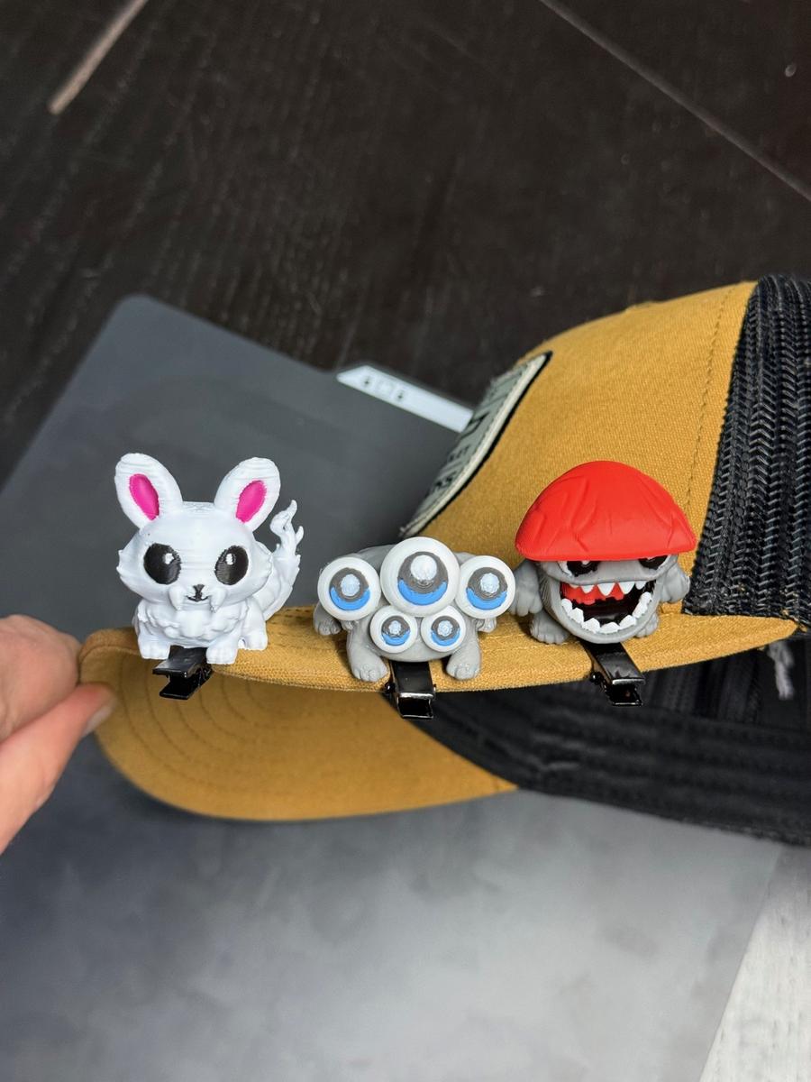 Three monsters on hat